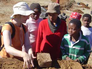 Description: A group of people watching a UEC demonstration. Tags: department of architecture, architecture, UEC, unit for earth construction, earth construction, construction